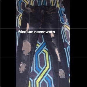 Distressed blue jeans